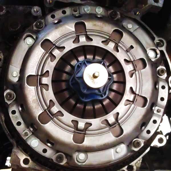 close up of a completed replaced clutch on a ford transit with clutch alignment tool still in