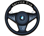 illustration of a modern car steering wheel with a display informing the driver his car service is now due