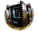 close up top view of a partialy dismantled ford differential revealing the large internal gears with a very effective red sheen applied