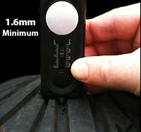 legal tyre depth is demonstrated on a tyre that is clearly worn but the depth gauge shows 1.6 mm