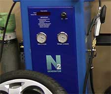 close up of our nitrogen tyre inflation system showing dials and a hand pump in our sheffield garage